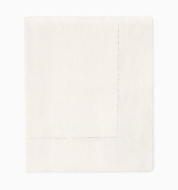The Sferra Festival Tablecloth, crafted in crisp white with subtle hand hemstitching along the border, is elegantly displayed against a plain white background—an ideal accent to enhance classic table settings.
