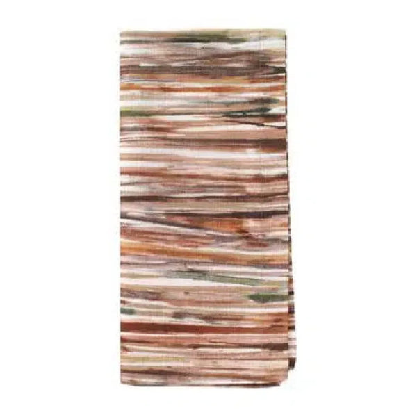 The Bodrum Sierra Napkin Hazel Set of 4 features folded rectangular napkins with an earthy striped pattern in brown, beige, orange, and hints of green—ideal for fall or Thanksgiving table decor.