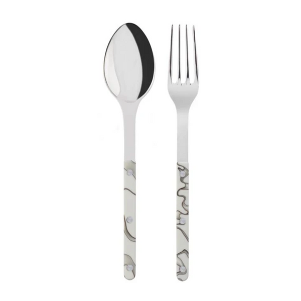 The Sabre Bistro Dune Salad Set includes a metal spoon and fork made from 18/10 stainless steel with shiny finishes and handcrafted acrylic handles in a wavy grey and black pattern.