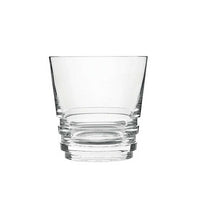A clear, empty Oxymore Drinkware tumbler by Saint-Louis with a wide rim, thick base, and three horizontal ridges is shown against a plain white background.