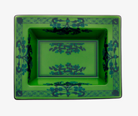 The Oriente Italiano Dinnerware Malachite by Ginori 1735 is a rectangular green ceramic dish with dark blue floral and geometric edge patterns—a striking piece of Italian tableware, shown from above.