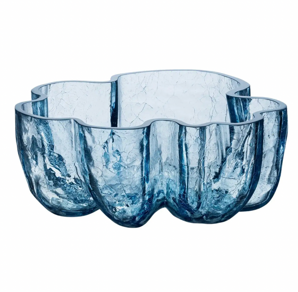 The Crackle Bowl Blue by Orrefors Kosta Boda features transparent blue crackle glass with a wavy, organic rim and a textured surface that evokes delicate petals or gentle waves.