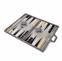 Open Brouk & Co Backgammon Set Onyx Silver featuring beautiful craftsmanship with black and white triangular points, light and dark checkers, two dice cups, and four dice.