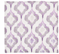 The Kim Seybert Watercolor Ikat Napkin Lilac & Grey Set of 4 features folded white linen napkins with a repeating lilac and grey watercolor-style Ikat pattern.