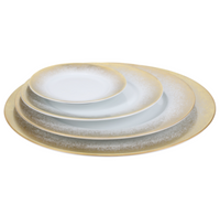 Add contemporary elegance to your table with the Yellow Fire Dinnerware by Royal Limoges, a stack of white plates featuring a yellow gold rim crafted from fine Limoges porcelain.