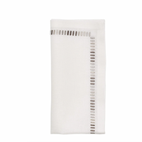 The Kim Seybert Harmonie Napkin in White, Gray & Silver features neatly folded white linen with small embroidered dashes in gray and taupe along two edges. Set of 4.