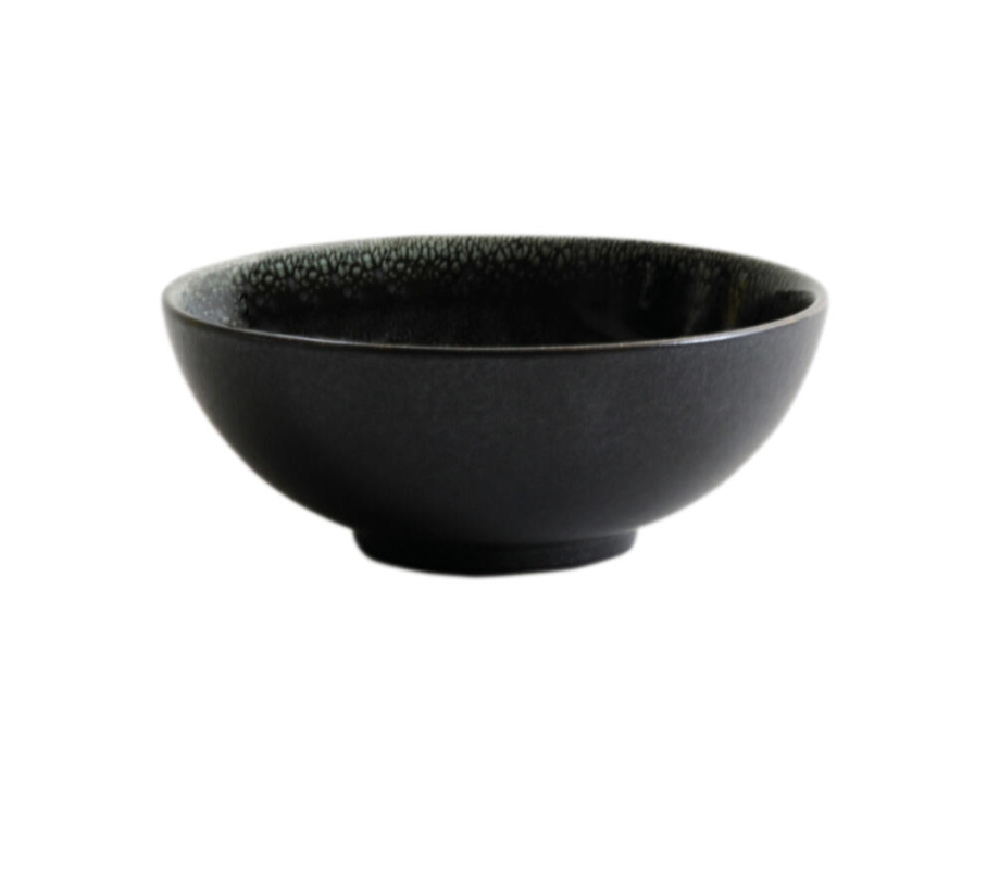 The Tourron Dinnerware Celeste by Jars - Rosenthal is a black glazed stoneware bowl with a smooth matte finish and gently curved sides, shown against a white background.