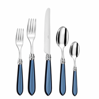 The Capdeco Diana Flatware 5 Piece Setting - Sapphire features blue-handled French cutlery, handcrafted in Thiers, including a dinner fork, salad fork, knife, soup spoon, and teaspoon with silver accents displayed on white.