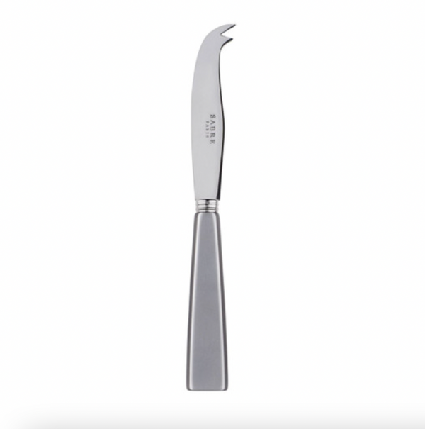 The Sabre Icone Large Cheese Knife in Light Grey features a flat handle, short curved blade, and forked tip—ideal for slicing and serving cheese. Crafted from stainless steel, it’s part of the stylish Icone Flatware collection.