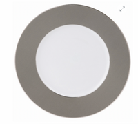 The Philippe Deshoulieres BIA Metallic Presentation Plate is round with a wide metallic gray rim and plain white center, accented by subtle platinum details and shown from above on a white background.