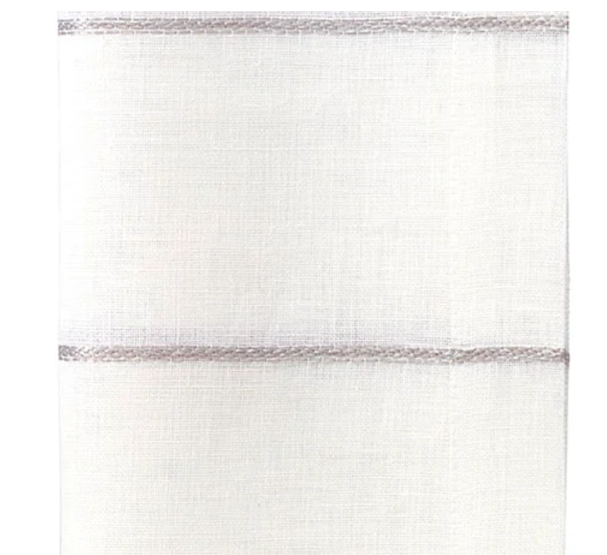 A close-up of Bodrum's Metallic Thread Napkin Silver Set of 4 shows sheer white fabric with subtle texture and two rows of light metallic stitching—ideal for elevating your table with soft, elegant linen napkins.