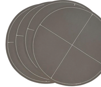 The Saro Trading Faux Leather Round Slate Placemat Set of 4 features stylish round mats with measurement markings and cutting guides—ideal as chic placemats or versatile baking tools. Shown from above on a white background.