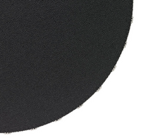 Close-up of Bodrum's Charm Placemat Black Set of 4, showing round black placemats with evenly spaced metal rings along the edge, against a white background.