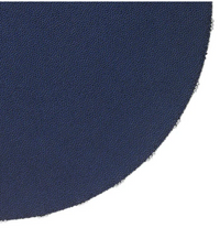 Round navy blue handcrafted Charm Placemat Navy with a textured surface and a beaded edge.