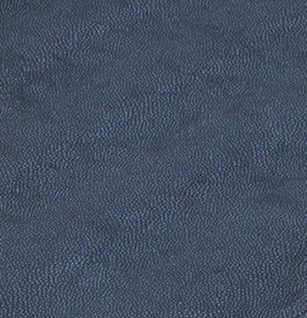 Close-up of the Stingray Handle Tray by Bodrum, showcasing its dark blue textured surface with evenly distributed small, rounded bumps that create a stippled look and evoke the tray’s sleek design with silver handles.