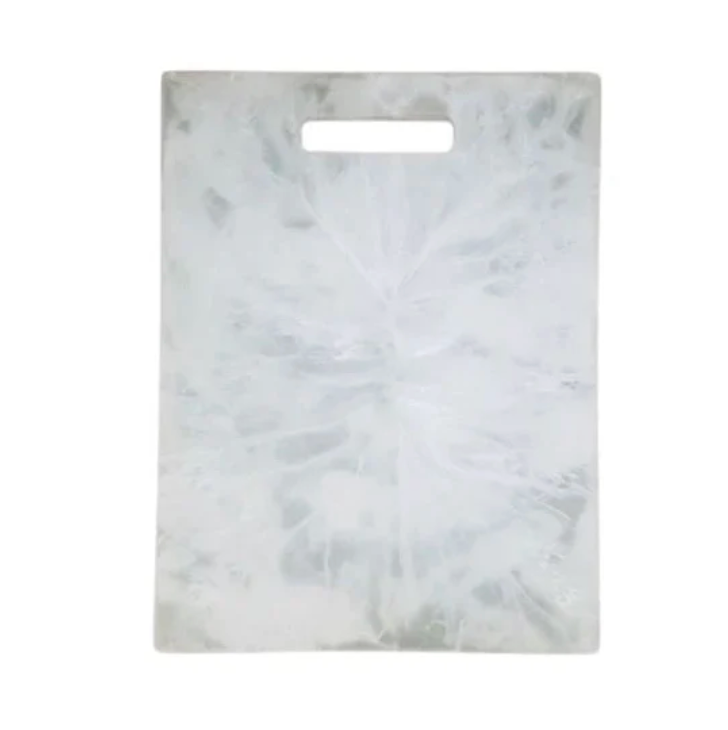 The Nashi Home Swirl Resin Rectangle Chopping Board White - Large features a marbled texture and top handle cutout, perfect for food prep or serving.