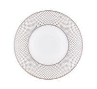 The Home Platinum Dinnerware by Robert Haviland & C. Parlon features a subtle interlocking geometric rim and a slim silver band—an elegant addition to any table.