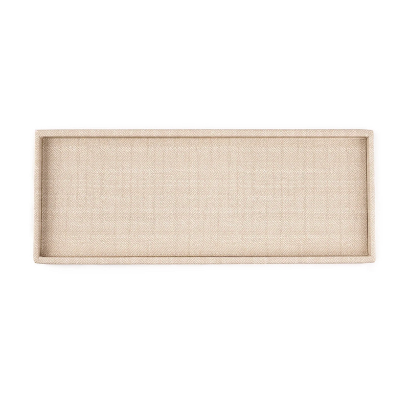 The Victoria Long Rectangle Serving Tray by Bold Decor is beige with raised edges and a subtle herringbone texture, shown from above on a white background.