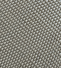 Close-up of the Leather Weave Pillow Ivory by Threads Soft Goods, featuring a beige woven texture with an oval pattern.