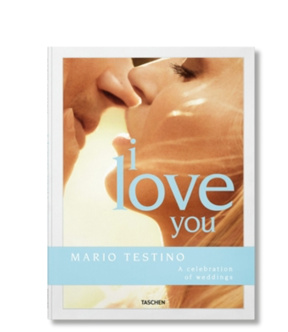 Book cover shows a couple about to kiss, with "Mario Testino: I Love You" in large blue letters. Celebrates weddings through iconic photography by Mario Testino. Published by Taschen/Ingram Publishing Services.