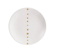 The Dibbern Golden Pearls Dinnerware Dessert Plate features a white ceramic design adorned with a striking line of golden pearls in varying sizes running vertically down the center.