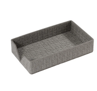 The Bodrum Wicker Guest Towel Holder is a rectangular, grey woven basket tray with three tall sides and one short side for easy access, featuring a textured wicker design.