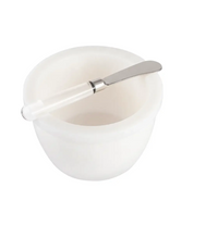 Inspired Generations’ Bright White Deli-gance With Spreader features a sleek ceramic bowl paired with a coordinating white-handled butter spreader, creating an elegant brunch serving accessory that beautifully elevates any table setting against its understated white backdrop.