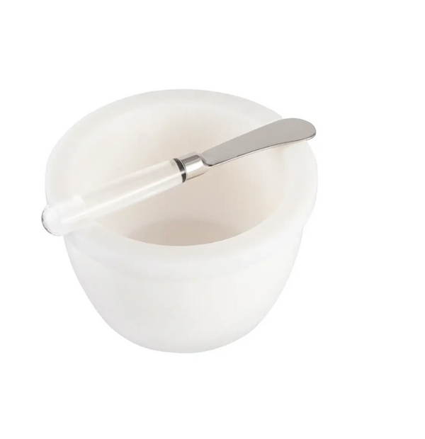 Inspired Generations’ Bright White Deli-gance With Spreader features a sleek ceramic bowl paired with a coordinating white-handled butter spreader, creating an elegant brunch serving accessory that beautifully elevates any table setting against its understated white backdrop.