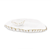 The Beatriz Ball Thanni Mystic Oval Platter w/ Bowl White & Gold - Large is a handcrafted serving piece with uneven edges, gold trim, and a matching small bowl placed on top.