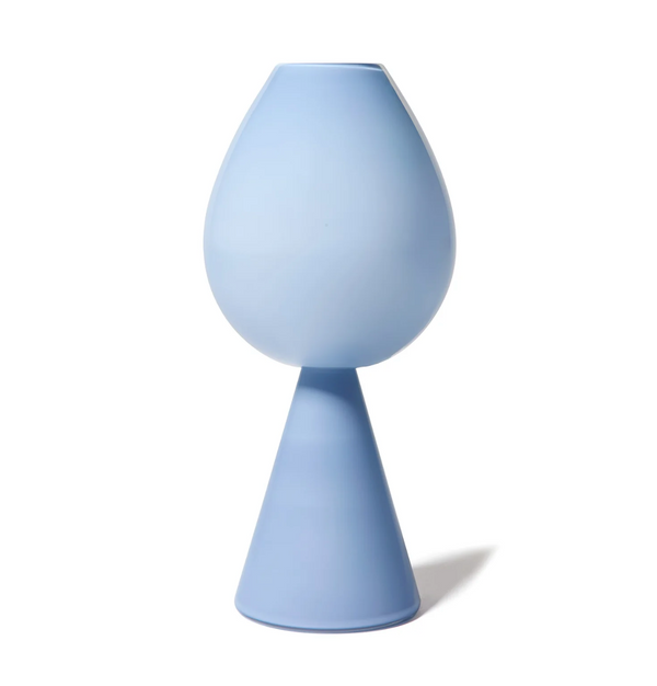 The Fiorelli Collection Vase - Dove by Cariati is a modern, minimalist glass vase in matte light blue with a round top and conical base, ideal for unique floral arrangements. Photographed on a white background.