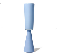 The Fiorelli Collection Vase - Dove - by Cariati features two stacked blue ceramic shapes—a tall cylinder atop an upside-down cone—evoking minimalist sculptural glass vases, shown against a plain white background.