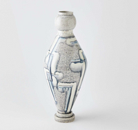 The Spindel Vase Grey Blue by Global Views/Surya features a tall, narrow neck and base with a speckled light gray finish and abstract blue-gray brushstrokes. This hand-painted vase is shown standing alone against a plain white background.