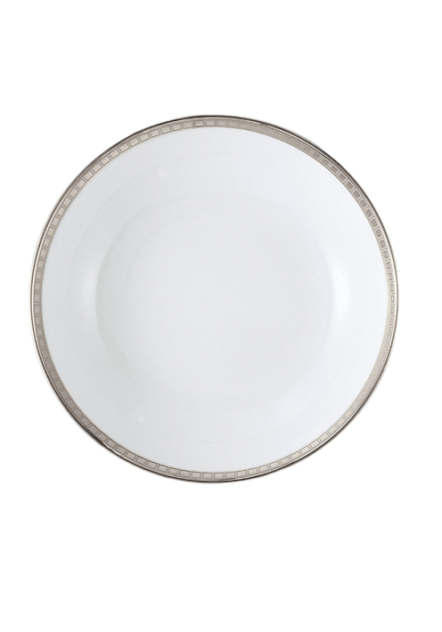 A white porcelain plate from Bernardaud's Athena Platinum Dinnerware, featuring a subtle silver geometric rim pattern, is photographed from above against a white background.