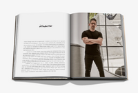 An open book, "Relaxed Luxury" by Assouline, displays an introduction on the left page and a photo of Chad Dorsey in a black t-shirt and glasses with arms crossed, standing in a modern, relaxed luxury interior on the right page.