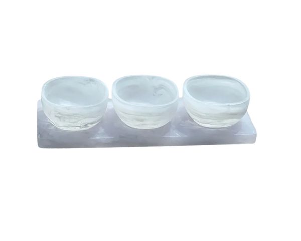 The BT- Shalom Dawn Resin Swirl 3 Dip Bowl Set in white features three small round translucent bowls arranged on a rectangular tray, perfect for serving dips.