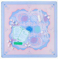 The Oh My Mahjong Rack & Pusher Set - Clear includes American Mahjong racks with clear acrylic pushers, shown on a decorative mat with tiles, dice, instruction cards, and other Mahjong accessories.