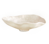 The Beatriz Ball Resin Alabaster Oval Bowl features a wide, shallow design with an irregular wavy rim and a smooth, marbled off-white surface—an ideal modern tableware accent for contemporary spaces.