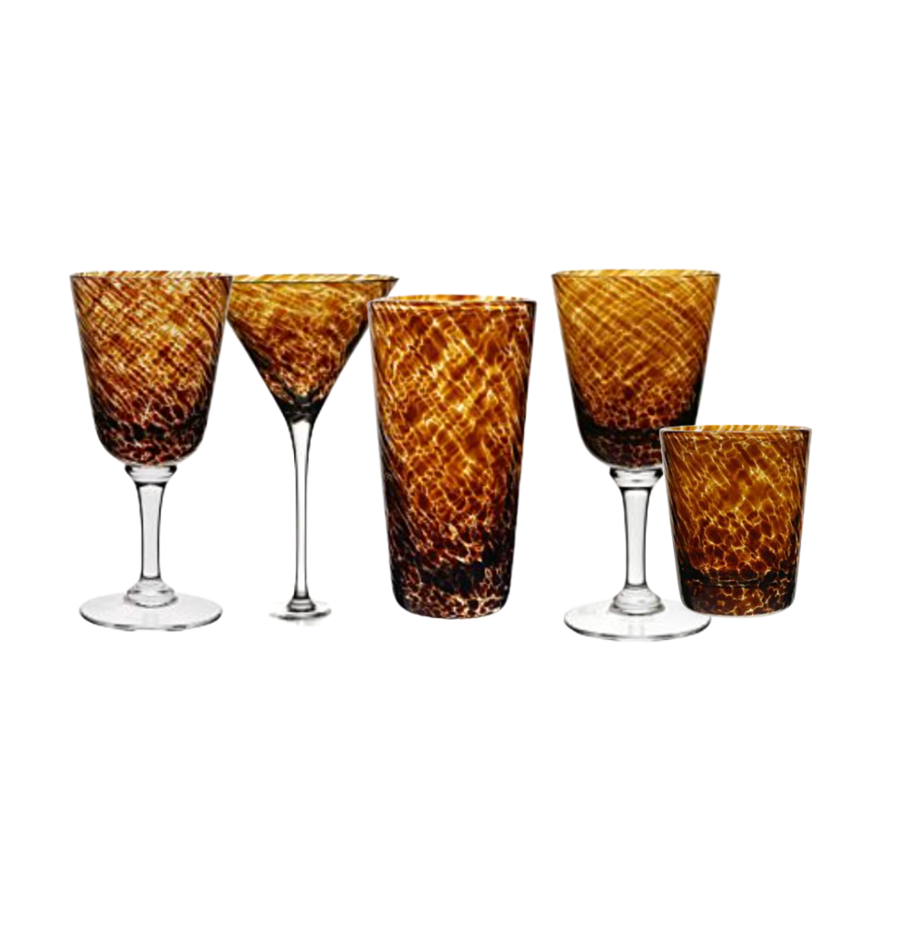 Five handcrafted Vanessa Drinkware Tortoise crystal pieces by William Yeoward—including wine, martini, highball, and old-fashioned glasses—are displayed in a row on white. True luxury drinkware for any occasion.