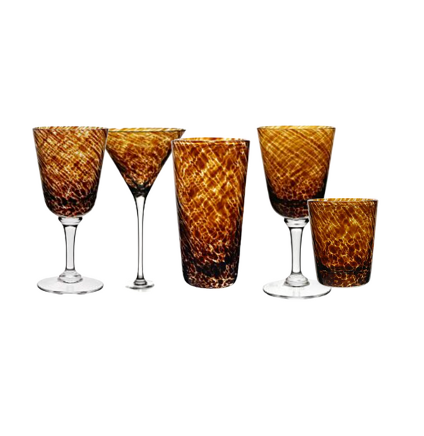Five handcrafted Vanessa Drinkware Tortoise crystal pieces by William Yeoward—including wine, martini, highball, and old-fashioned glasses—are displayed in a row on white. True luxury drinkware for any occasion.