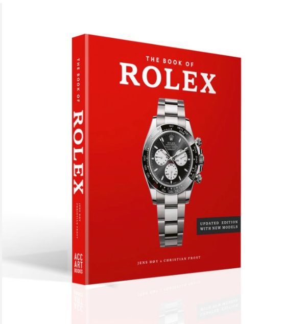 The Book of Rolex by ACC ART BOOKS / SIMON & SCHUSTER is an updated guide with a red cover and silver Rolex watch, featuring details on new models and tips to spot fakes. Essential for Rolex enthusiasts.