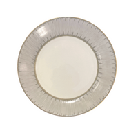 A round, white ceramic Marie Daâge Ruban 1 Dinnerware plate with a light gray ridged border, viewed from above on a white background.