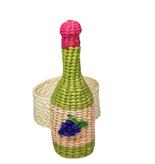 Enhance your table with Coro Cora’s Wine Napkin Ring Set of 4—handcrafted in Colombia with woven straw in green, pink, and beige hues, each accented by a cluster of purple grapes. Perfect artisanal decor to pair with matching woven pieces.