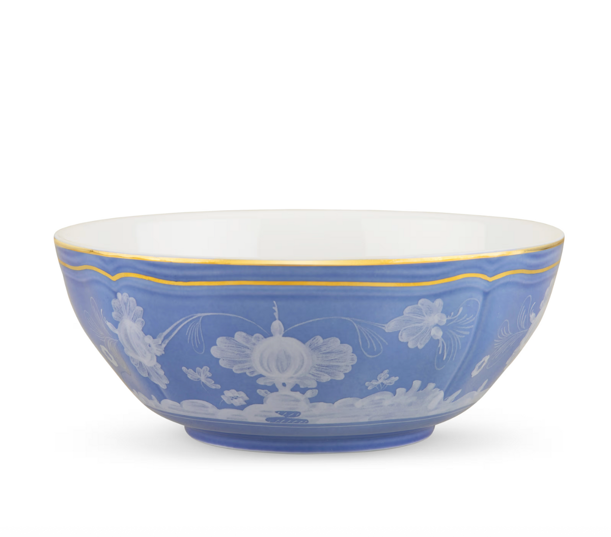 A blue Oriente Italiano Pervinca porcelain bowl by Ginori 1735, featuring white floral patterns, a scalloped white border, and a delicate 24-karat gold trim around the top edge.