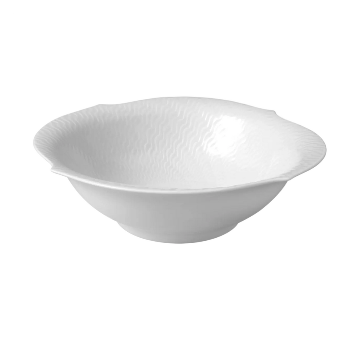 A white porcelain bowl with an organically shaped, wavy textured rim from the Meissen Waves Relief Dinnerware collection, photographed against a light gray background for a modern and elegant tableware presentation.