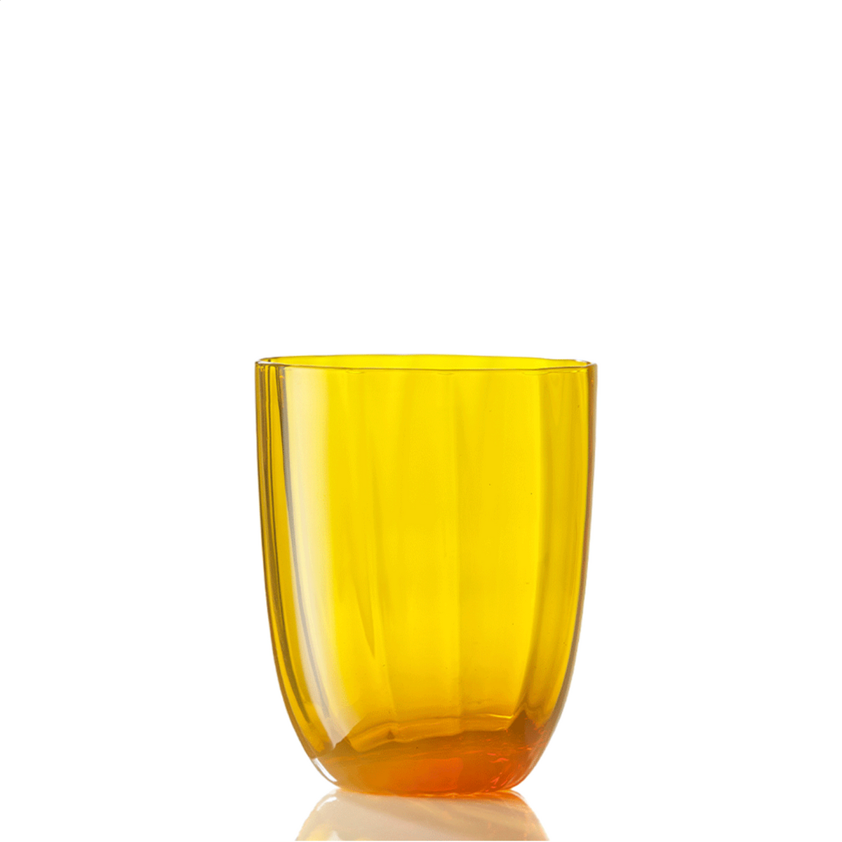 An Idra Tumbler Optic by Nason Moretti, crafted in transparent yellow glass with smooth, rounded edges, is displayed on a white background with a faint reflection beneath it.