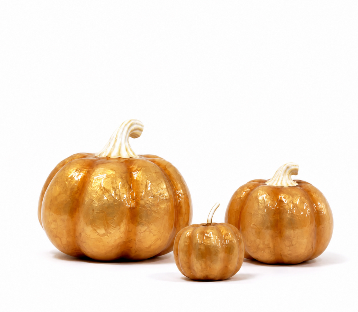 Three metallic gold Capiz Pumpkin Gold pumpkins of varying sizes for elegant décor.