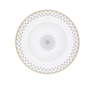 A Mottahedeh/Robert Haviland Home Dinnerware- Gold porcelain bowl featuring a gold rim and a geometric pattern of gray squares and gold accents around the border and in the center.