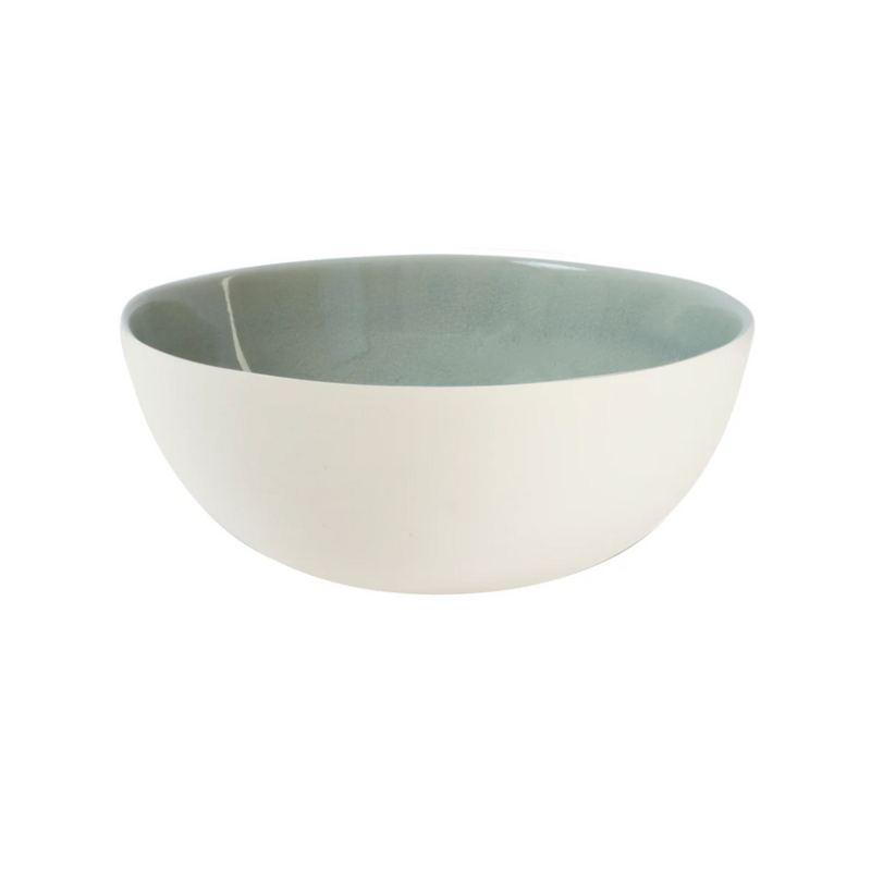 The Maguelone Cachemire Dinnerware by Jars - Rosenthal is a handmade ceramic bowl featuring a white exterior and glossy, light grayish-green interior, displayed on a plain white background.