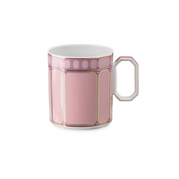 The Swarovski Signum Rose Pink Mug by Swarovski x Rosenthal features a geometric gold and white pattern and an angular handle, displayed on a white background—ideal for gifting in its luxury box.