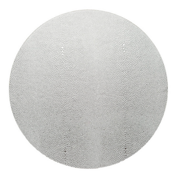 The Kim Seybert Pebble Placemats Set of 4 features large, round placemats with a uniform small-dot pattern on a white background, offering a subtle yet intricate look—perfect for elevating elegant table settings.